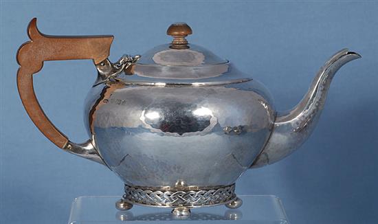 A Georged V silver Arts & Crafts three piece tea set,